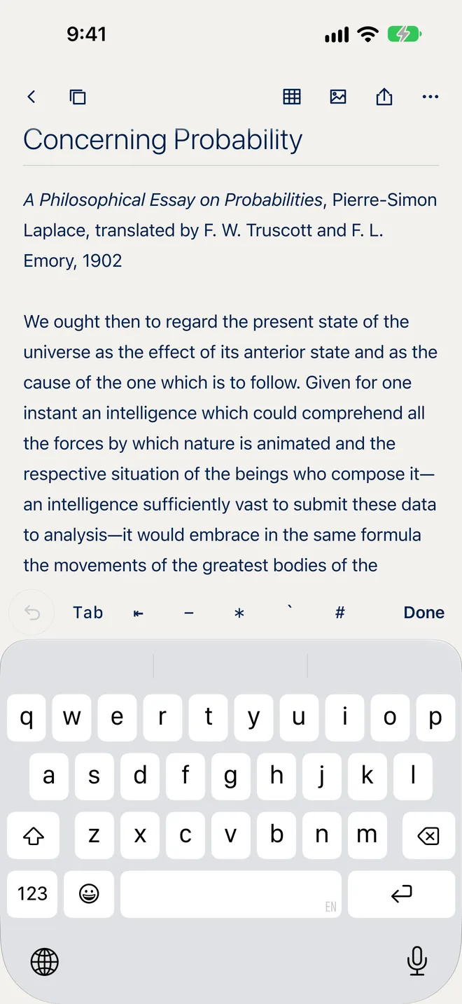 Writing on iPhone: above the keyboard, a bar with the undo button, Tab, the outdent arrow, hyphen, asterisk, backtick and hash, and Done.