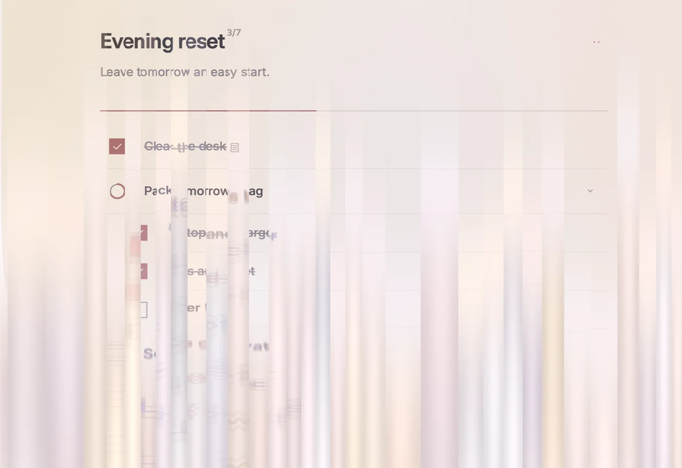 The reset on a Mac: columns of soft coloured light rise through the Evening reset checklist.